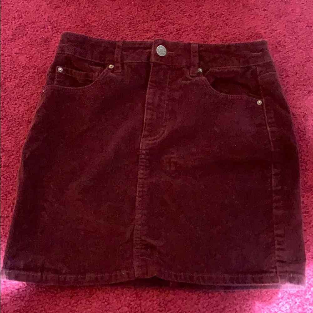 A burgundy skirt